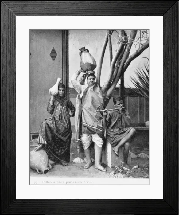 Framed Print : Young Egyptian Arab girl water carriers Framed Print : Young Egyptian Arab girl water carriers