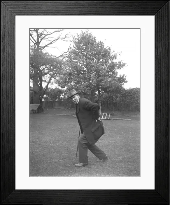 Framed Print : Elderly man on a lawn in Devon Framed Print : Elderly man on a lawn in Devon