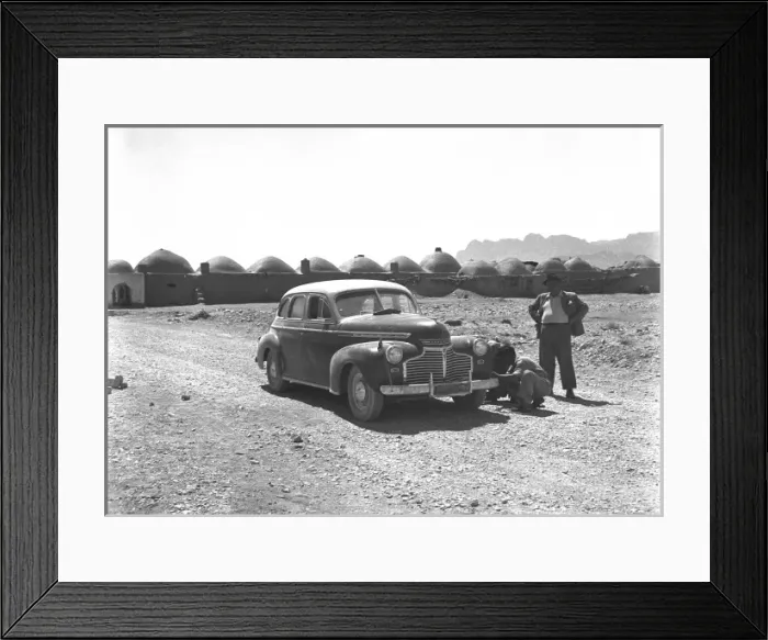 Framed Print : Two people and their car in Iran Framed Print : Two people and their car in Iran