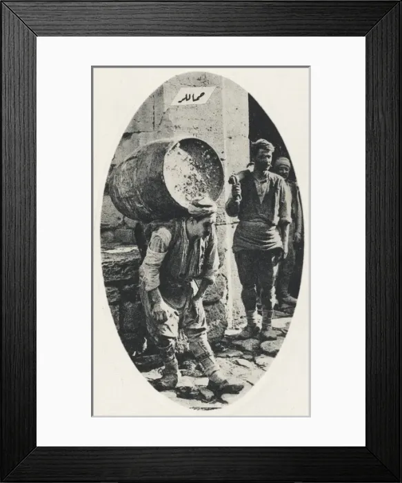 Framed Print : Porter carrying a heavy load Framed Print : Porter carrying a heavy load