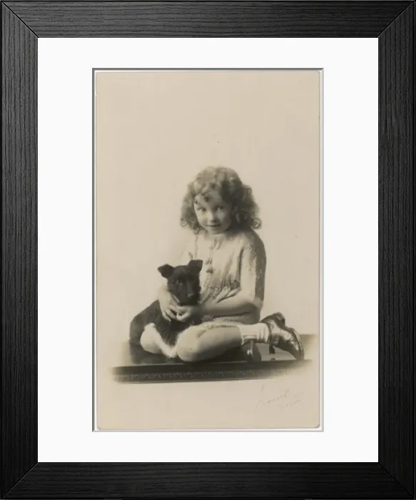 Framed Print : Girl Holding Dog Framed Print : Girl Holding Dog