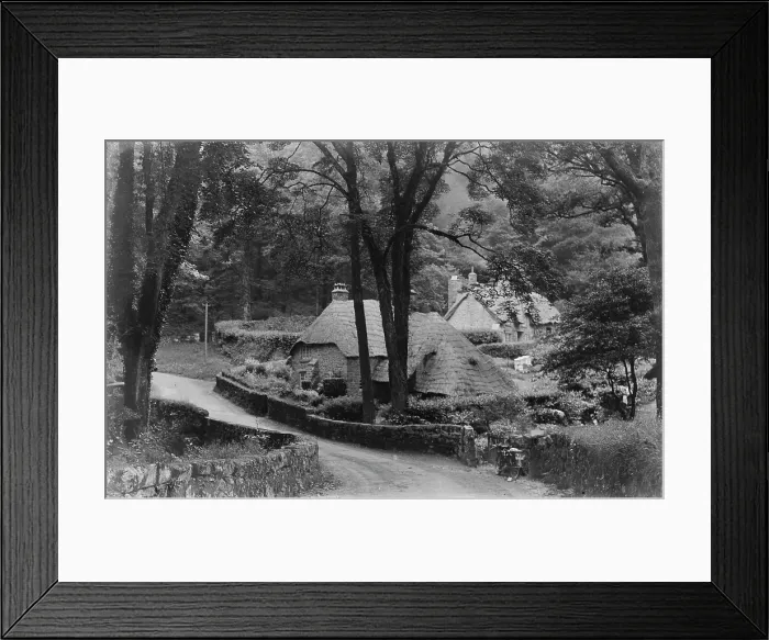 Framed Print : Quaint Thatched Cottages in a Serene Landscape Framed Print : Quaint Thatched Cottages in a Serene Landscape