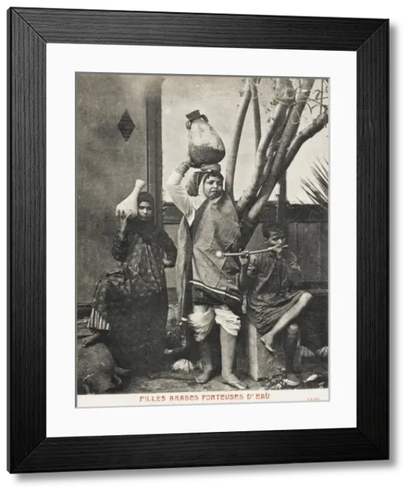 Framed Print : Lady Water Carriers, Port Said Egypt Framed Print : Lady Water Carriers, Port Said Egypt