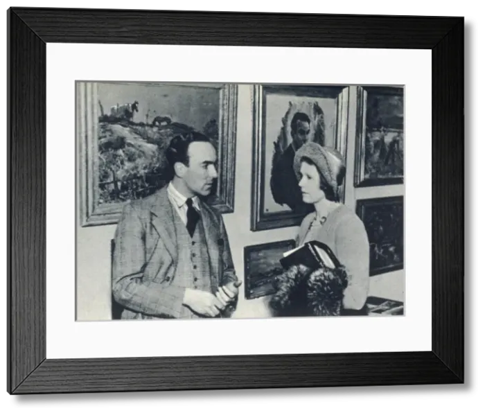 Framed Print : Edward Seago(1910 - 1974) and Lady Melchett at his exhibitio Framed Print : Edward Seago(1910 - 1974) and Lady Melchett at his exhibitio
