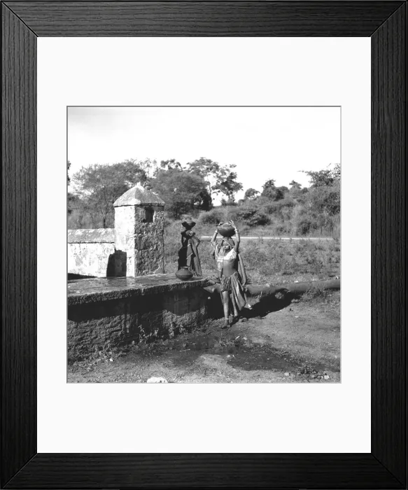 Framed Print : Carrying water from a well, Mandu, India Framed Print : Carrying water from a well, Mandu, India