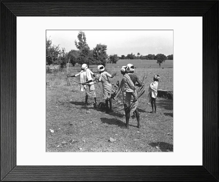 Framed Print : Men with bows and arrows, Madhya Pradesh, India Framed Print : Men with bows and arrows, Madhya Pradesh, India