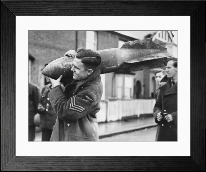 Framed Print : Carrying away an unexploded bomb Framed Print : Carrying away an unexploded bomb
