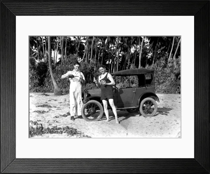Framed Print : Drinking by an Austin 7 car on the beach Framed Print : Drinking by an Austin 7 car on the beach