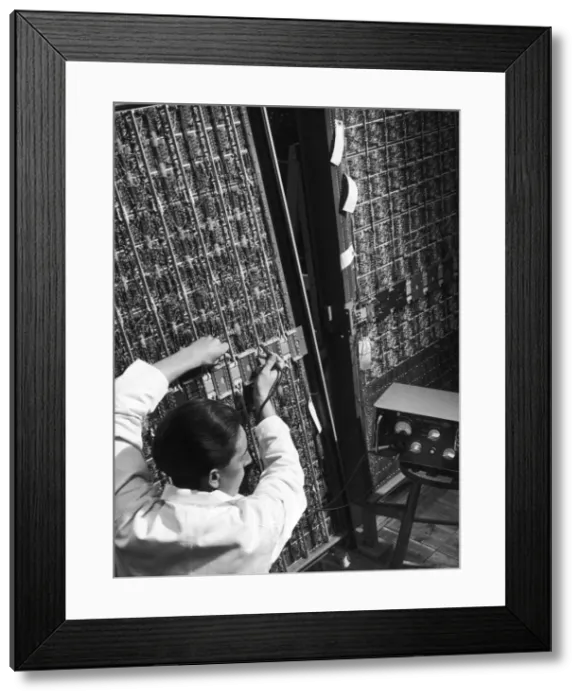 Framed Print : Measuring the current of a large electronic device Framed Print : Measuring the current of a large electronic device