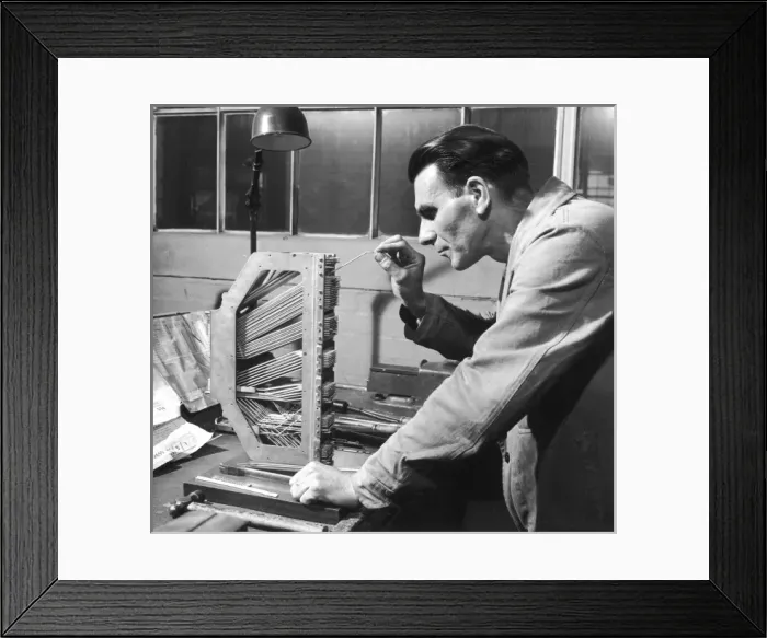 Framed Print : Assembling the wiring for a complex machine Framed Print : Assembling the wiring for a complex machine