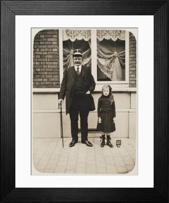 Framed Print : Belgium - Senior Belgian Railway Official & daughter Framed Print : Belgium - Senior Belgian Railway Official & daughter