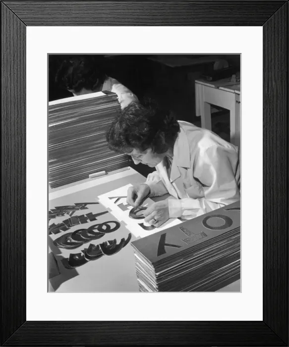 Framed Print : Assembling a Sign Framed Print : Assembling a Sign