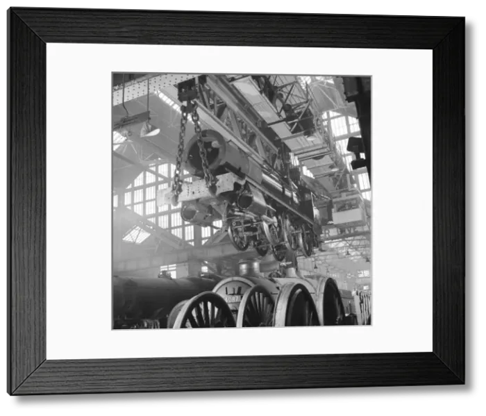 Framed Print : Locomotive construction in a large railway shed Framed Print : Locomotive construction in a large railway shed