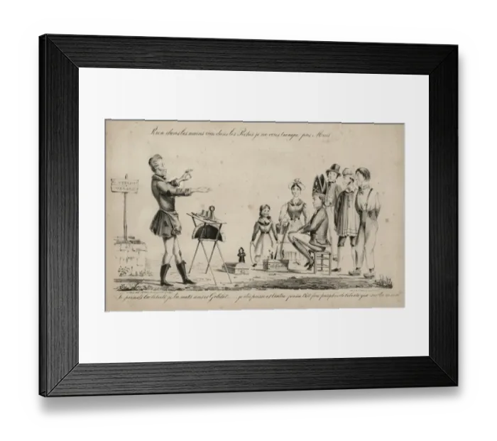 Framed Print : Magician performing the cup and balls trick to a small crowd Framed Print : Magician performing the cup and balls trick to a small crowd
