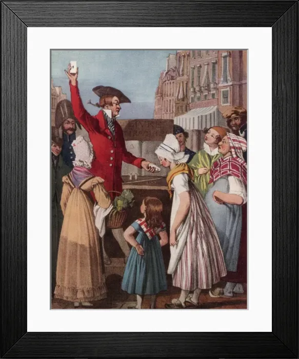 Framed Print : Magician performing card trick to gathered crowd Framed Print : Magician performing card trick to gathered crowd