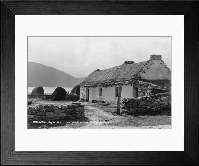 Framed Print : Traditional Cottage and Turf Stacks in Keel Framed Print : Traditional Cottage and Turf Stacks in Keel