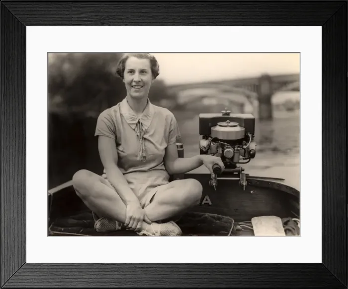 Framed Print : Lady steering boat Framed Print : Lady steering boat