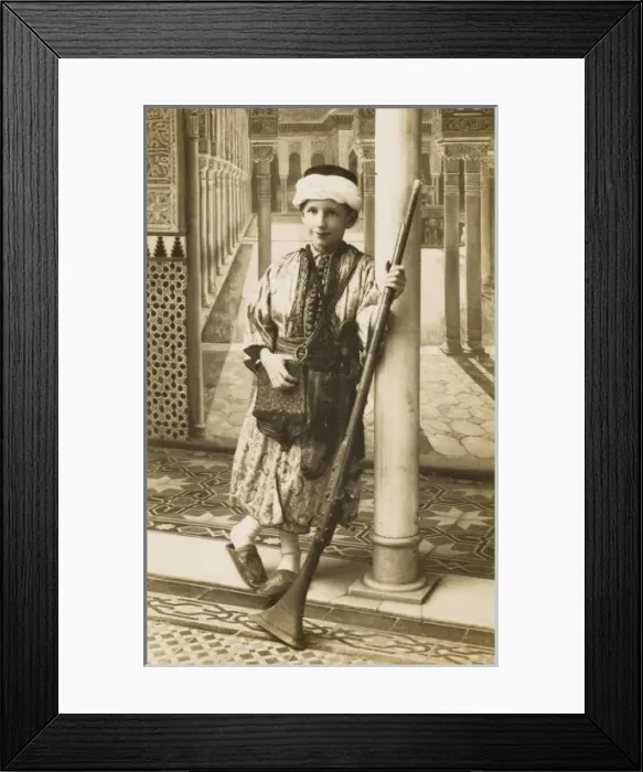 Framed Print : Turkish boy standing with a traditional rifle Framed Print : Turkish boy standing with a traditional rifle