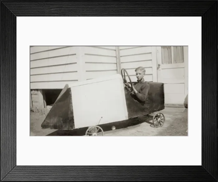 Framed Print : Boy in a toy car Framed Print : Boy in a toy car