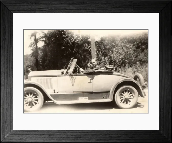 Framed Print : Father and daughter in sports coupe Framed Print : Father and daughter in sports coupe