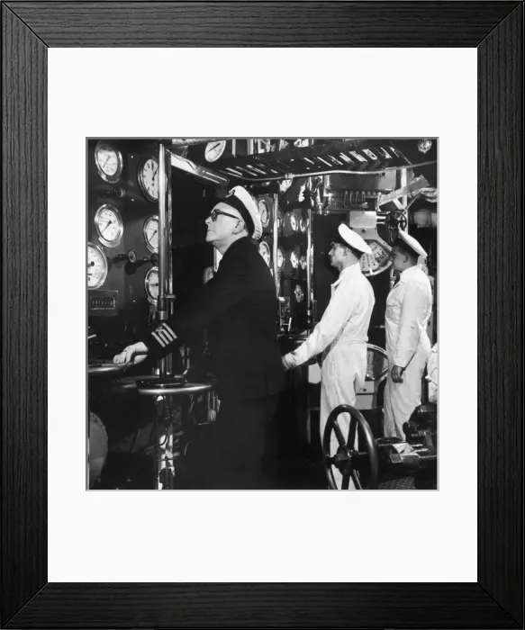 Framed Print : The captain checks the dials Framed Print : The captain checks the dials