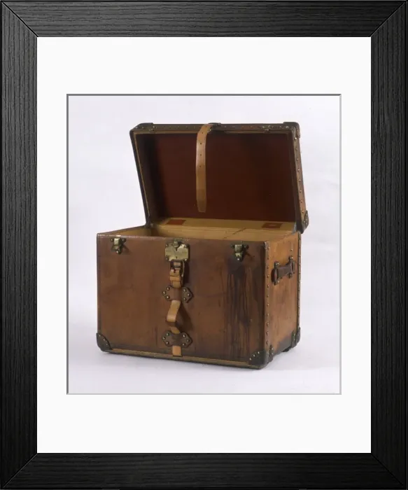 Framed Print : Luggage. A large leather-bound trunk with straps, buckles and locks Framed Print : Luggage. A large leather-bound trunk with straps, buckles and locks