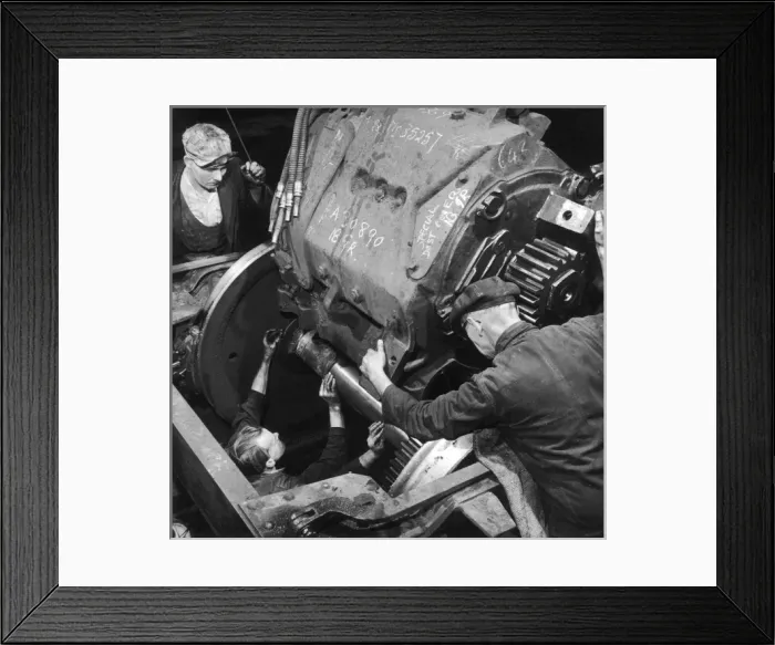 Framed Print : Installing an engine for a diesel locomotive Framed Print : Installing an engine for a diesel locomotive