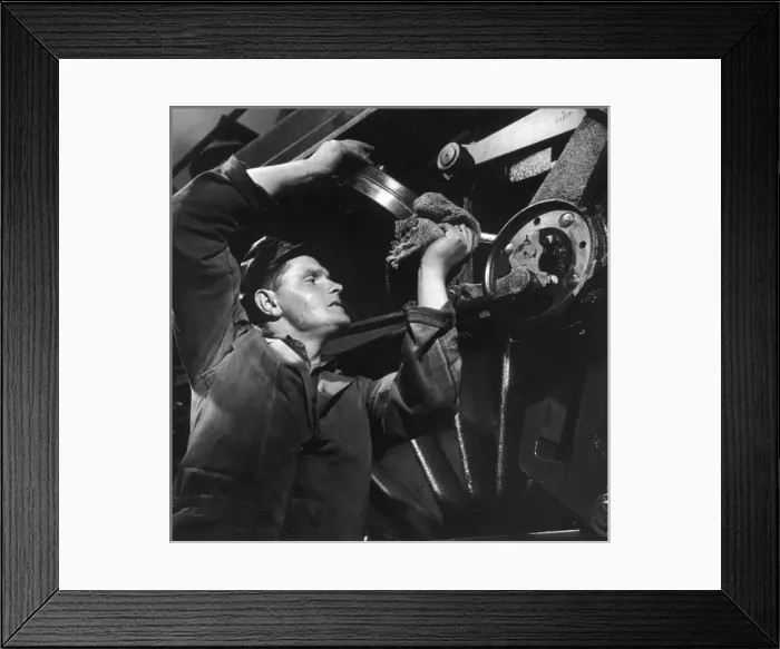 Framed Print : Oiling a Locomotive Wheel and Piston Framed Print : Oiling a Locomotive Wheel and Piston