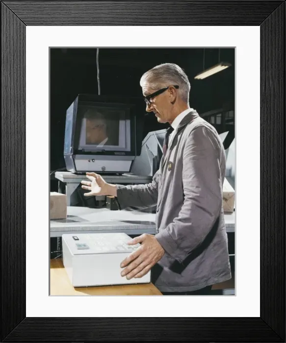 Framed Print : Factory worker operating control box Framed Print : Factory worker operating control box