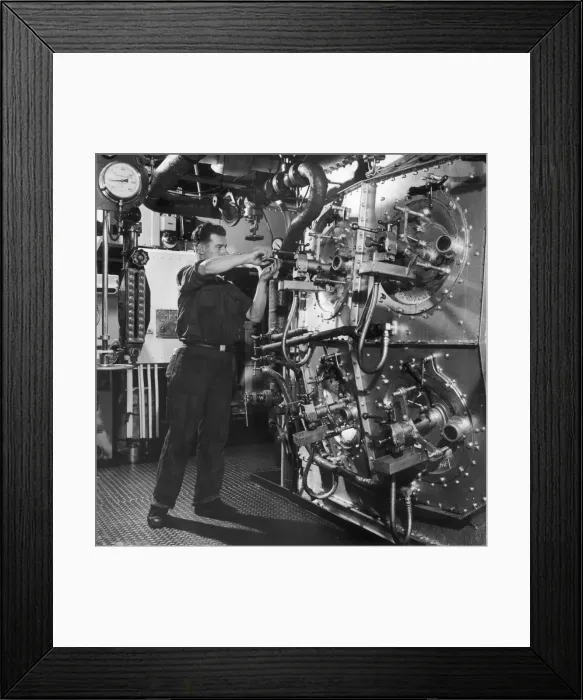Framed Print : Adjusting a valve in a submarine Framed Print : Adjusting a valve in a submarine