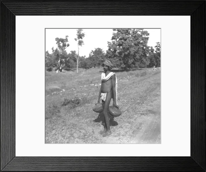 Framed Print : Man with jars, Mandu, Madhya Pradesh, Central India Framed Print : Man with jars, Mandu, Madhya Pradesh, Central India