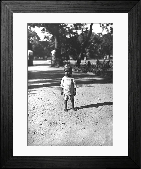 Framed Print : A young Indian toddler on a dusty road Framed Print : A young Indian toddler on a dusty road