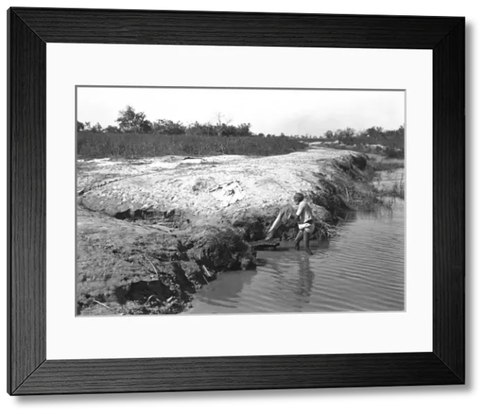 Framed Print : Washing clothes in the river, India Framed Print : Washing clothes in the river, India