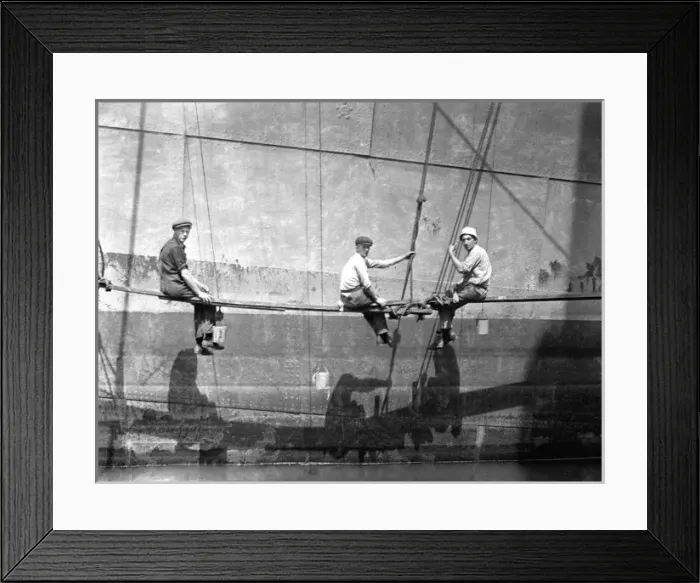 Framed Print : Men painting the side of a large boat Framed Print : Men painting the side of a large boat