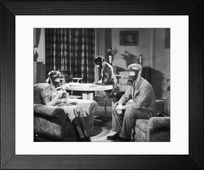 Framed Print : Family wearing gas masks Framed Print : Family wearing gas masks
