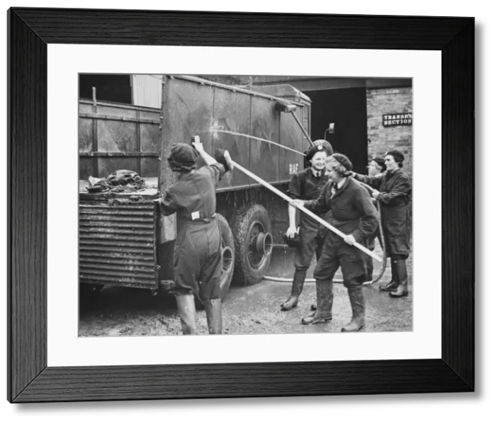 Framed Print : WaF WWII. WaFs washing down an RAF lorry during World War II Framed Print : WaF WWII. WaFs washing down an RAF lorry during World War II