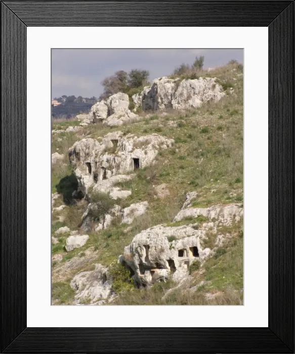 Framed Print : Cliff-face tombs carved into solid rock, near Ferla, Sicily Framed Print : Cliff-face tombs carved into solid rock, near Ferla, Sicily