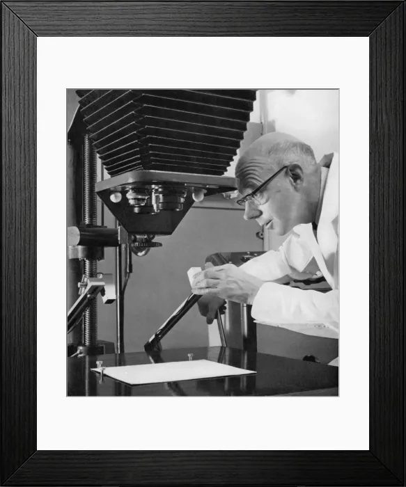 Framed Print : Operating a Vertical Projector Framed Print : Operating a Vertical Projector