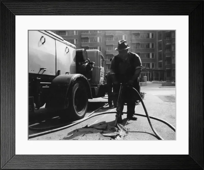 Framed Print : Digging up the tarmac on a road Framed Print : Digging up the tarmac on a road