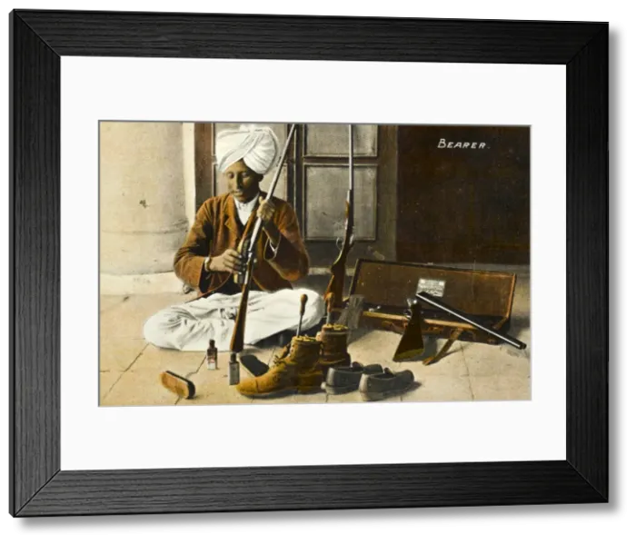Framed Print : Indian servant cleaning his Masters equipment Framed Print : Indian servant cleaning his Masters equipment