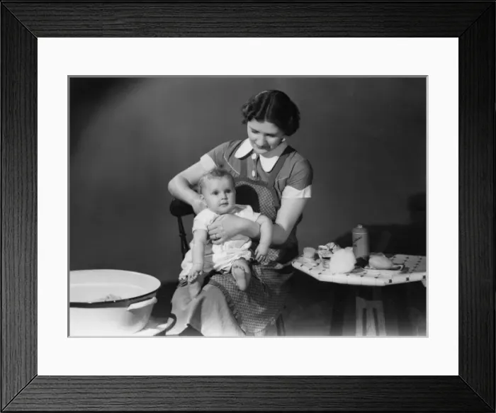 Framed Print : Getting baby ready for his bath Framed Print : Getting baby ready for his bath