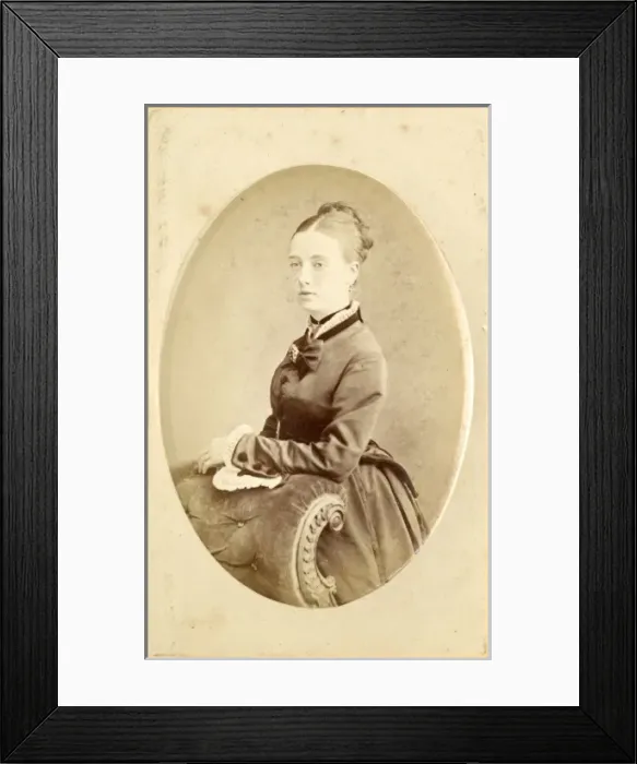 Framed Print : Young Victorian woman leaning on chair back Framed Print : Young Victorian woman leaning on chair back
