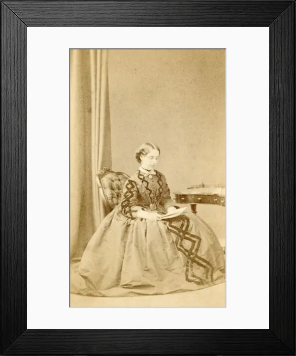 Framed Print : Young Victorian woman reading a letter Framed Print : Young Victorian woman reading a letter