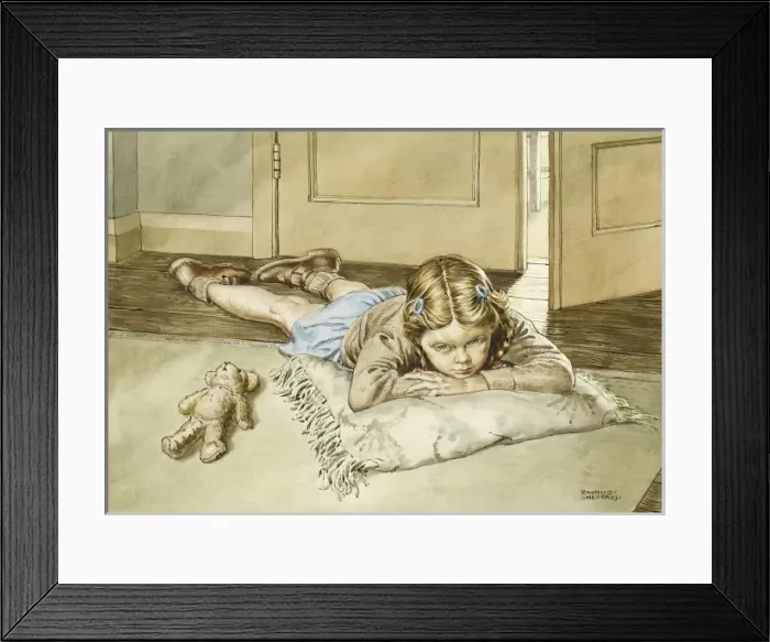 Framed Print : Young girl lying on a cushion alongside her teddy Framed Print : Young girl lying on a cushion alongside her teddy