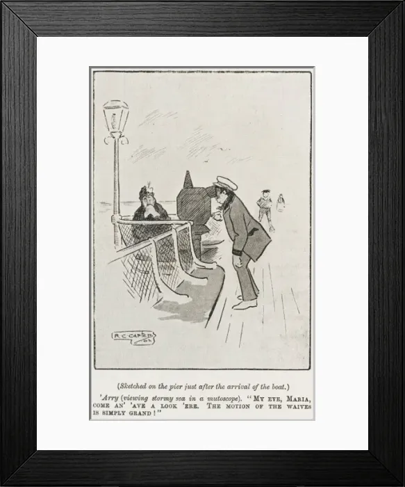 Framed Print : Man looking through a mutoscope on the pier Framed Print : Man looking through a mutoscope on the pier