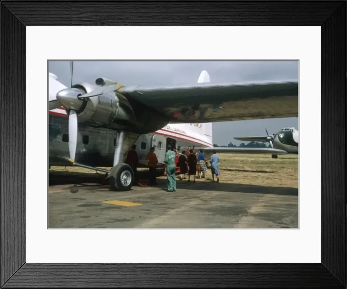 Framed Print : People boarding a small aeroplane Framed Print : People boarding a small aeroplane