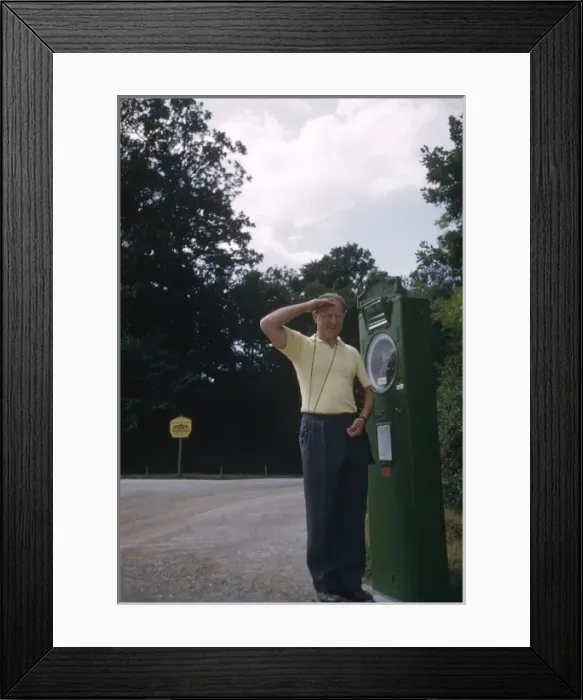 Framed Print : Man on a weighing machine, Austria Framed Print : Man on a weighing machine, Austria