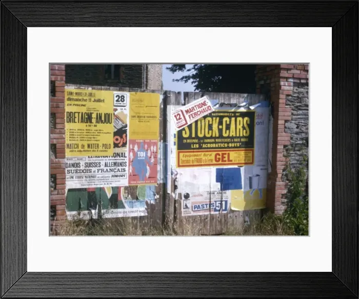 Framed Print : Posters on a fence, western France Framed Print : Posters on a fence, western France