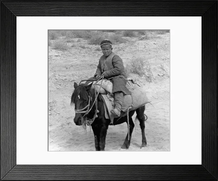 Framed Print : Young boy on a donkey, Kashgar, western China Framed Print : Young boy on a donkey, Kashgar, western China