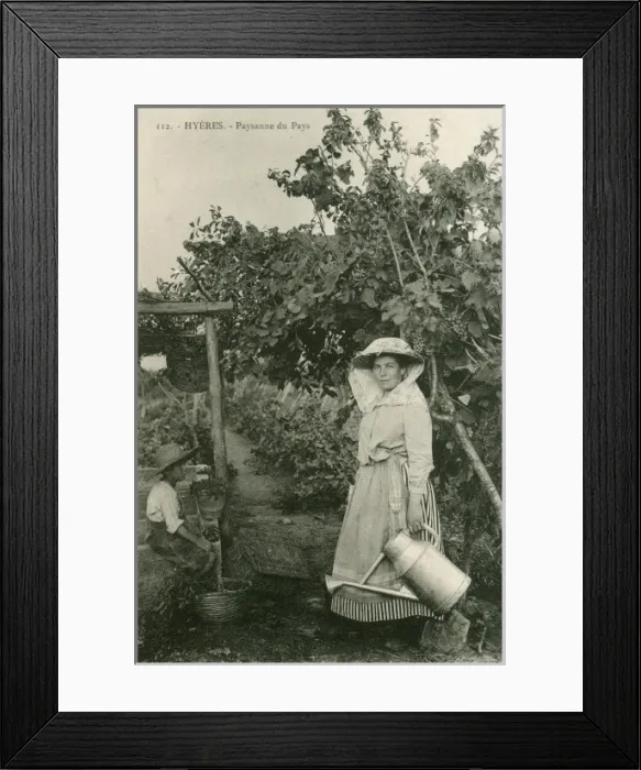 Framed Print : Hyeres, France - Countrywoman with watering can Framed Print : Hyeres, France - Countrywoman with watering can